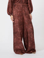 Wide-fit printed silk trousers