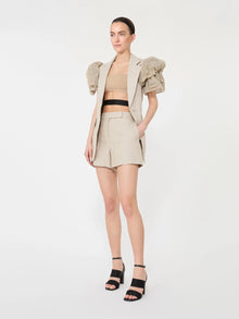 Oversized sleeveless linen jacket with ruffles