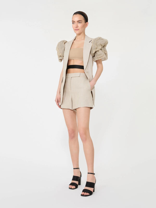 Oversized sleeveless linen jacket with ruffles