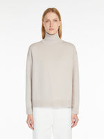 Wool and cashmere polo-neck sweater